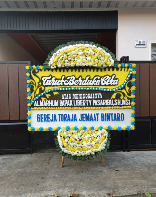 Papan Bunga Duka di Palu Utara